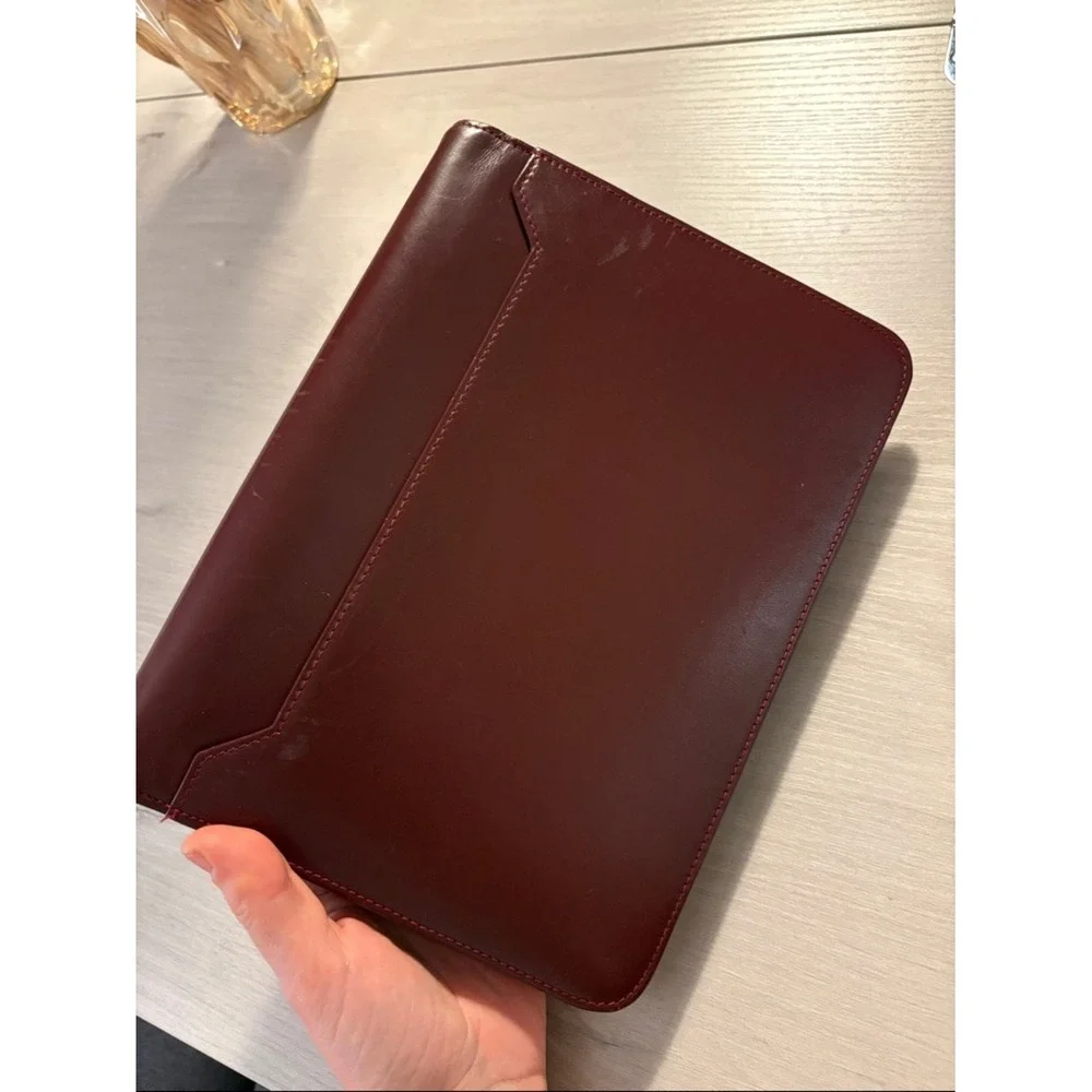 Cartier Burgundy Leather wristlet with Gold Corners‎